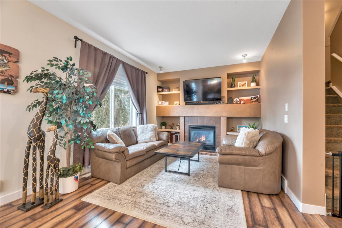 331 Ranch Ridge Meadow Strathmore firm sold end unit townhome listed by Lush Realty