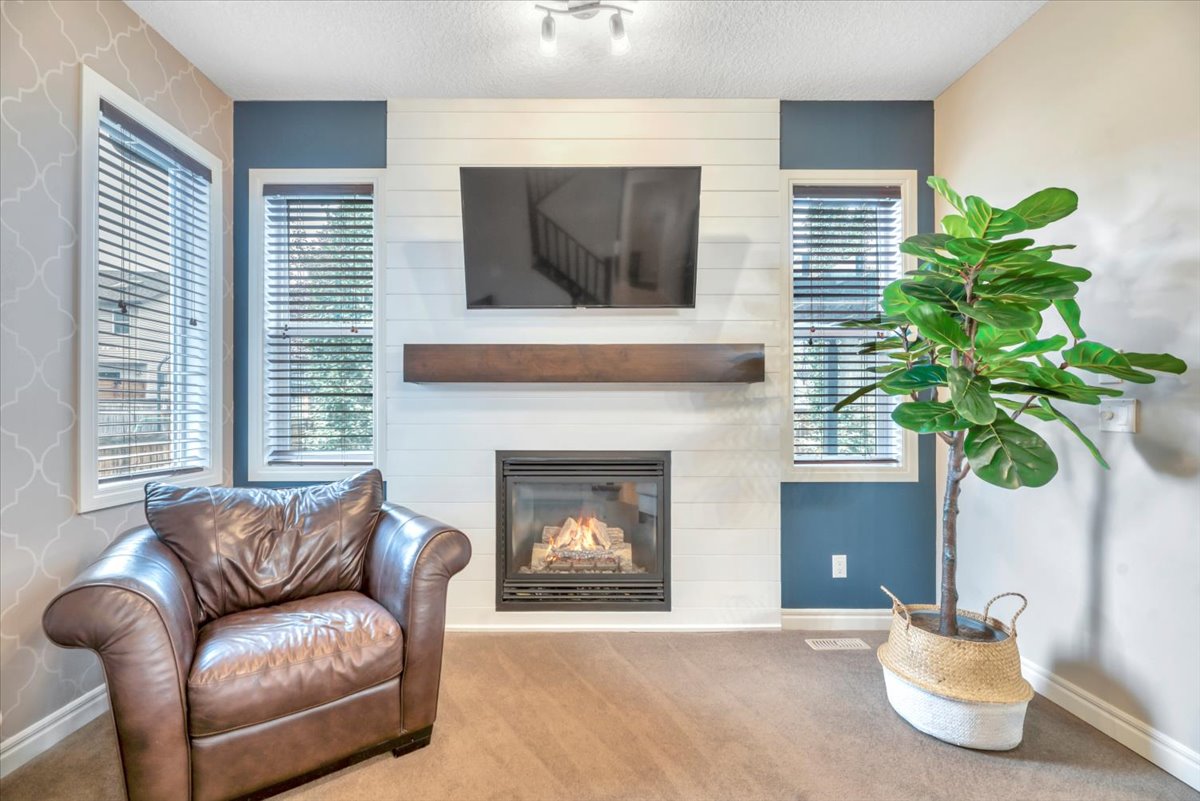 13 Cranberry Avenue SE Calgary living room looking toward kitchen