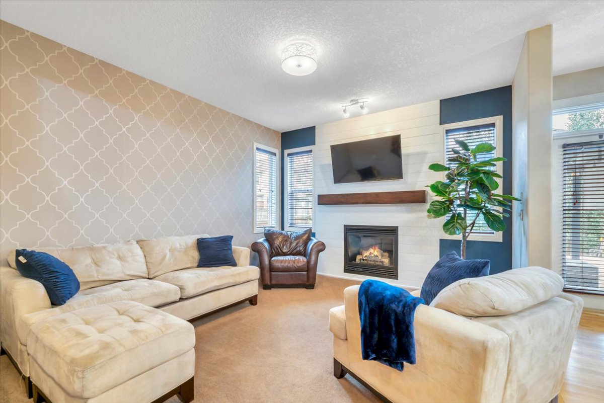 13 Cranberry Avenue SE Calgary living room with fireplace