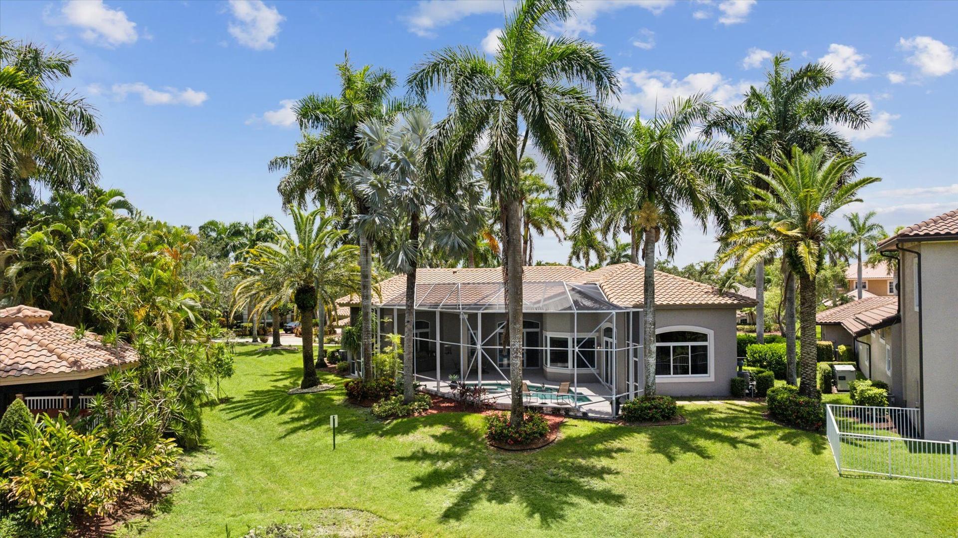 Waterfront home setting in The Falls at Heron Bay
