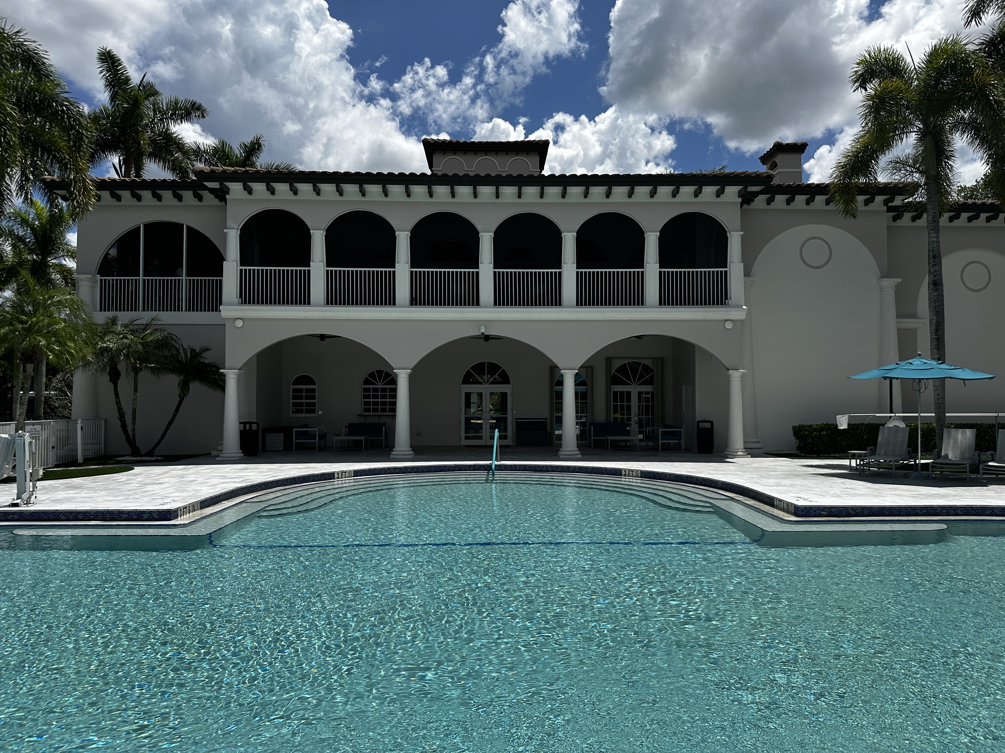 The Commons clubhouse and community pool steps in Heron Bay, Coral Springs, Florida