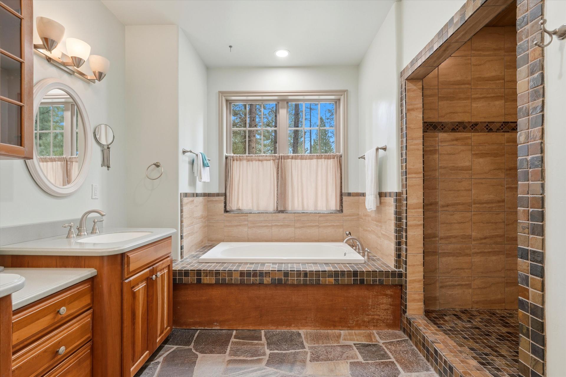 A master bathroom second to none. Jacuzzi tub, complemented by a walk in shower bigger than most walk in closets. A master bathroom second to none. Jacuzzi tub, complemented by a walk in shower bigger than most walk in closets.