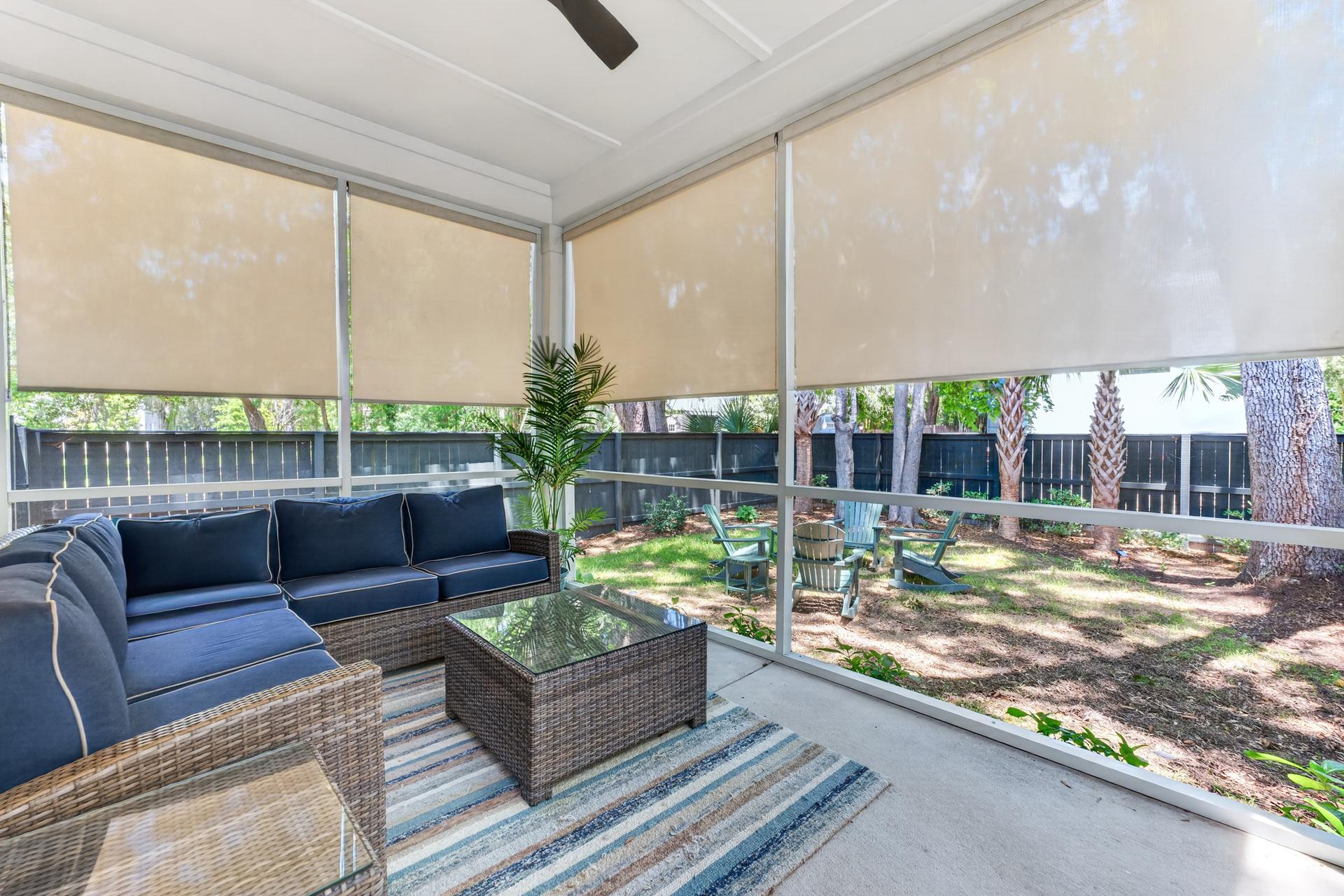 Screened porch overlooking the backyard at 1407 Dahlia Road