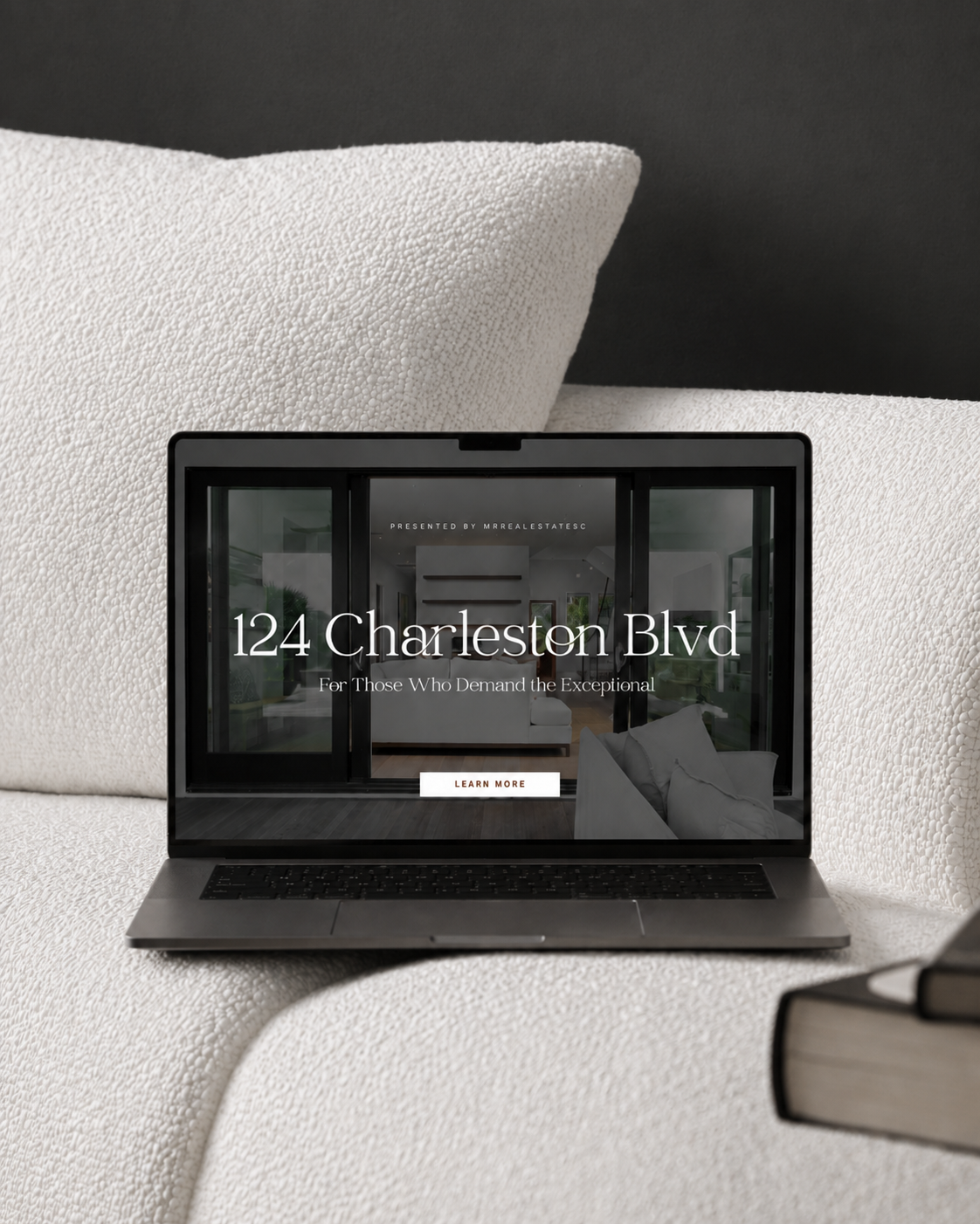Dedicated luxury property website displayed on a laptop